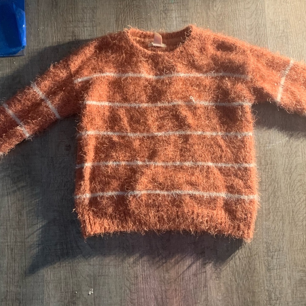 Furry pink and white stripped pull over